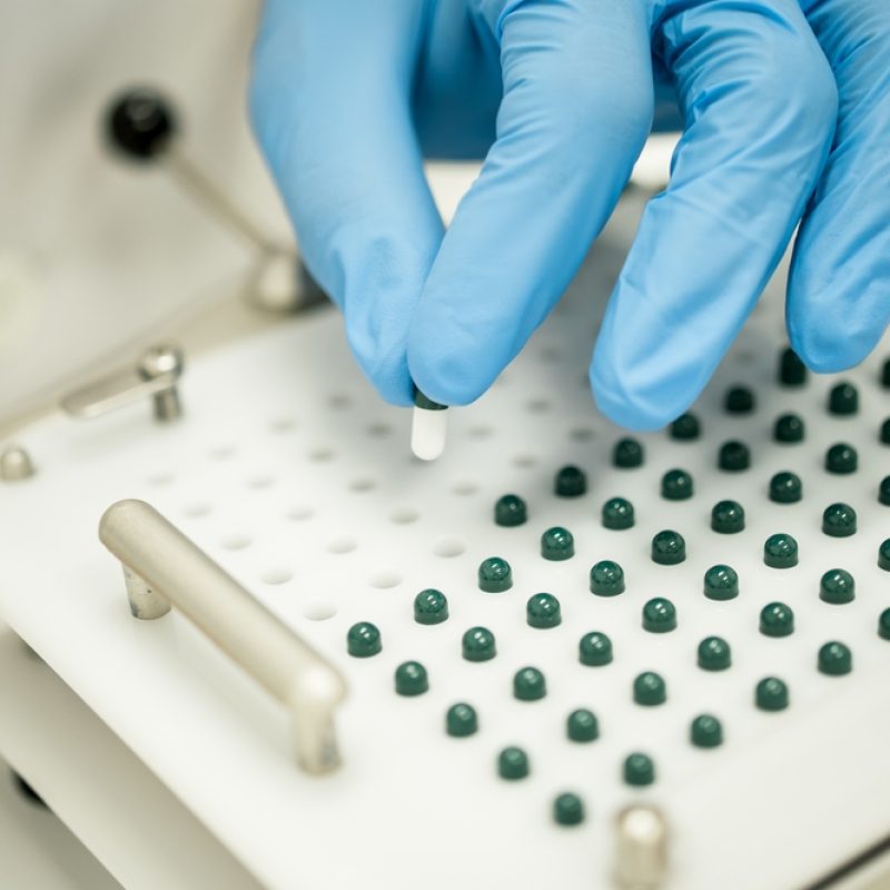 Crop,Compounding,Pharmacist,Putting,Pill,Into,Capsule,Filler Crop,Compounding,Pharmacist,Putting,Pill,Into,Capsule,Filler